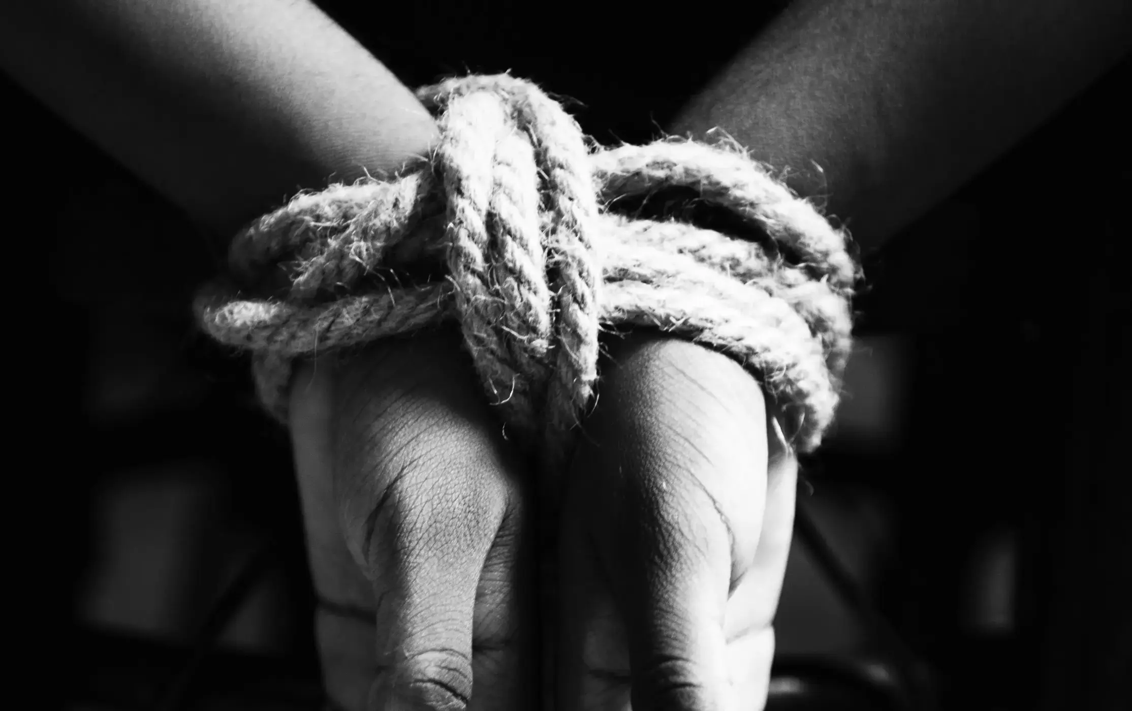 Hands Tied With Rope Around 1