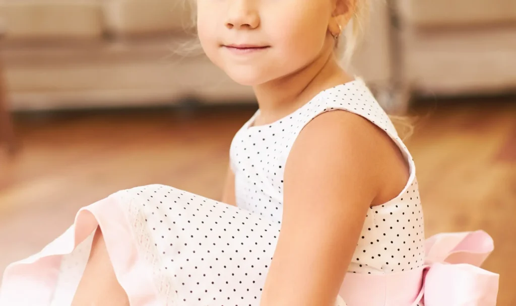 Indoor Shot Cute Little Princess Wearing Beautiful Pink Dress Sitting Floor Home Getting Ready Children S Performance Kindergarten With Adorable Blue Eyes 1 Scaled