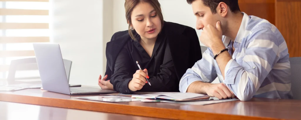 Lawyer Advising Seated Client