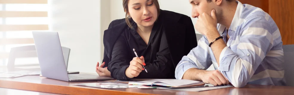 Front View Young Beautiful Businesswoman Black Shirt Black Jacket Along With Young Man Discussing Work Issues Inside Her Office Work Job Building